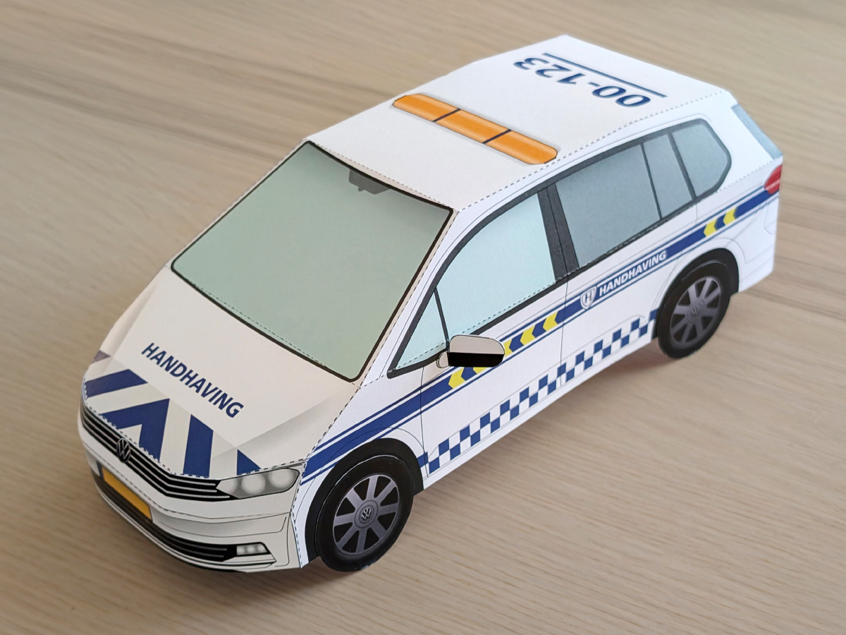 Built paper enforcement car on a table